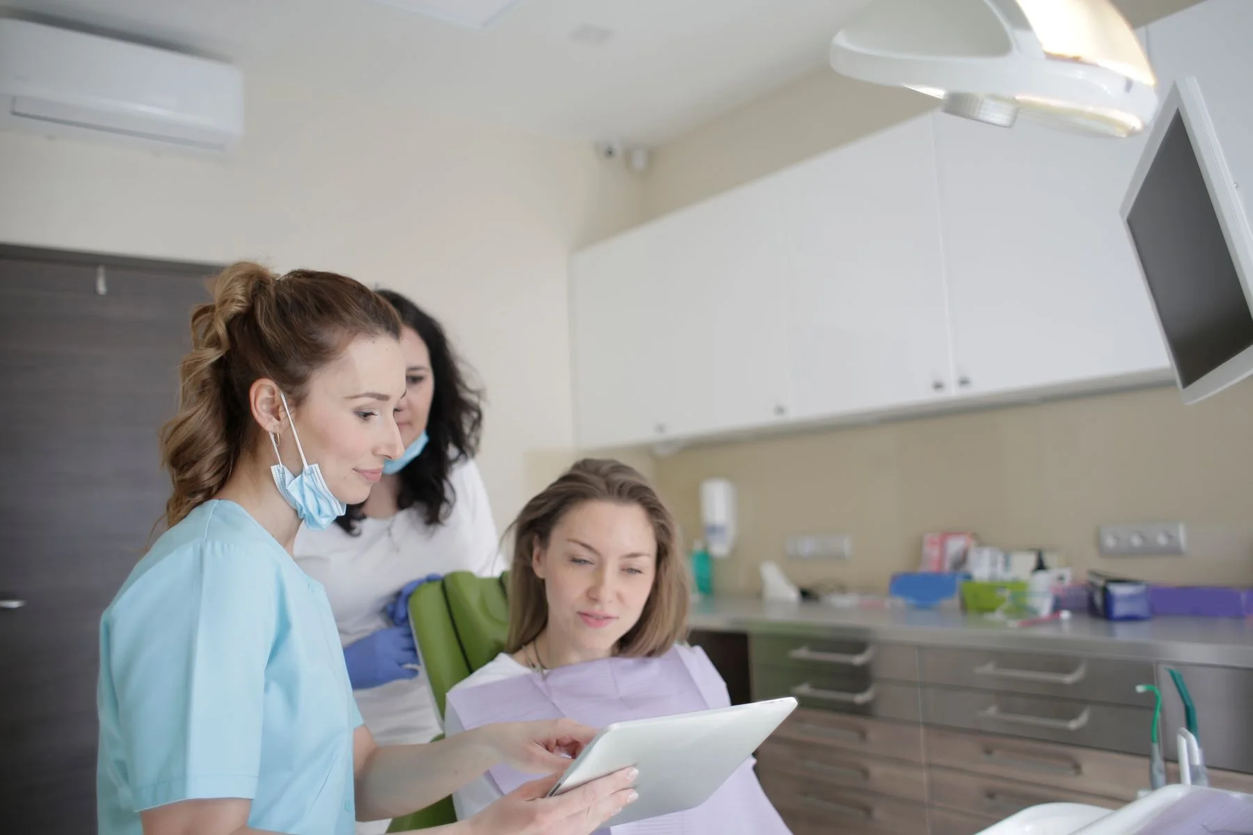 Dentist in a personal consultation